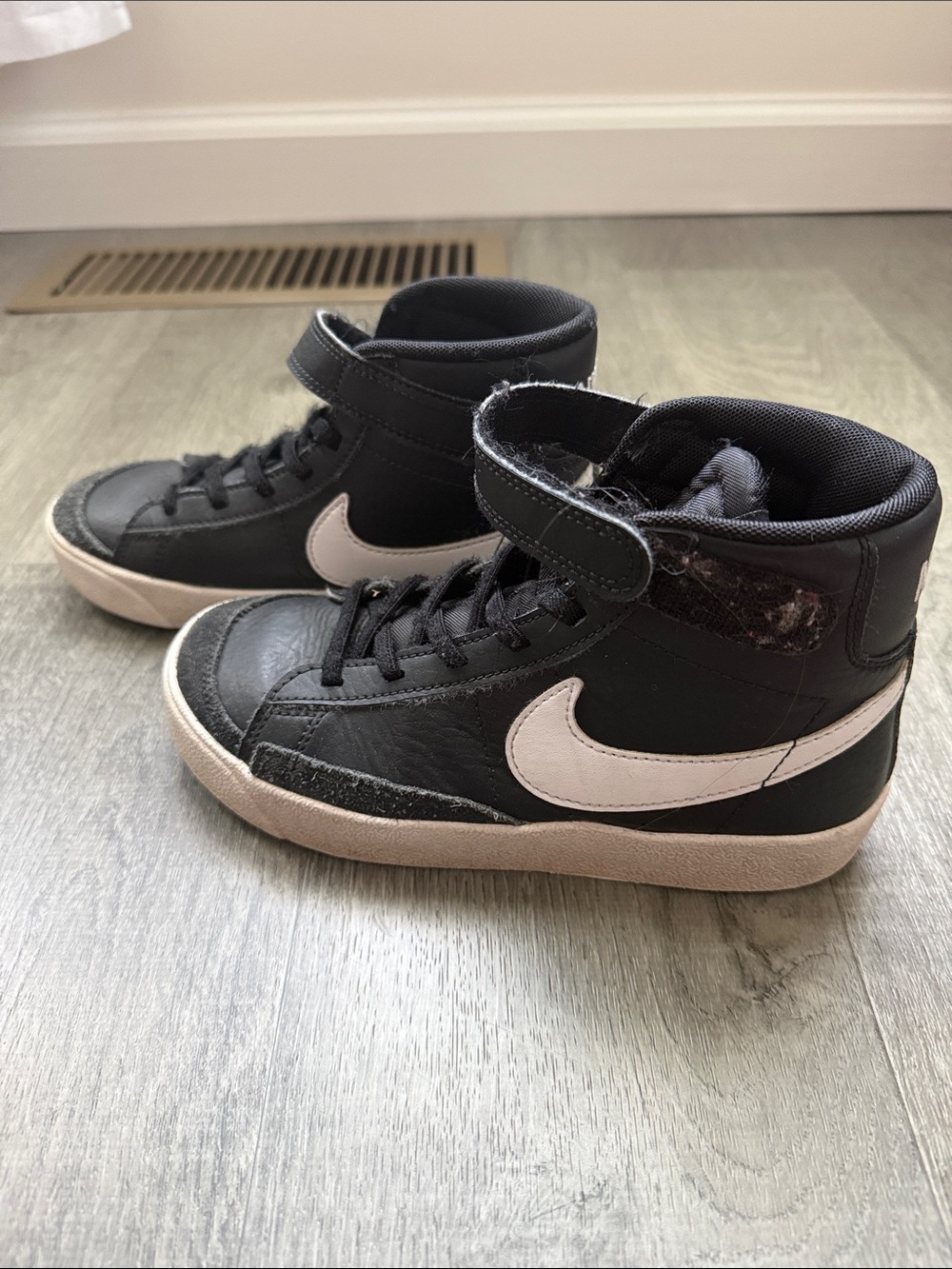 Nike Kids Black High-Top Sneakers with White Swoosh and Tan Sole